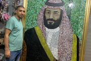 سعودي ومصري متيمان بحب ولي العهد بأكبر لوحة من الزجاج